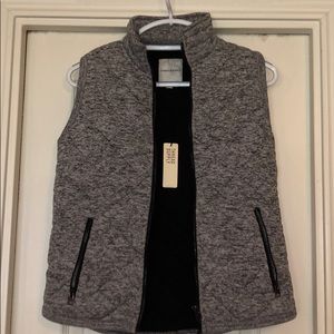 Grey and white stitched vest